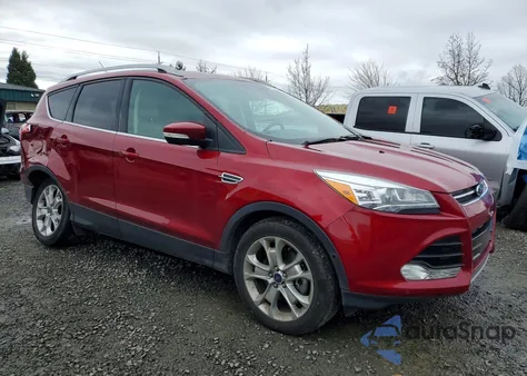 2016 Ford Escape Titanium z USA, uszkodzony, nr VIN 1FMCU9J91GUA95573